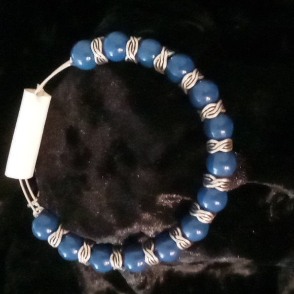Alex and Ani Jewelry - Alex and Ani bangles bracelet blue beaded with a Celtic knot design bead.
